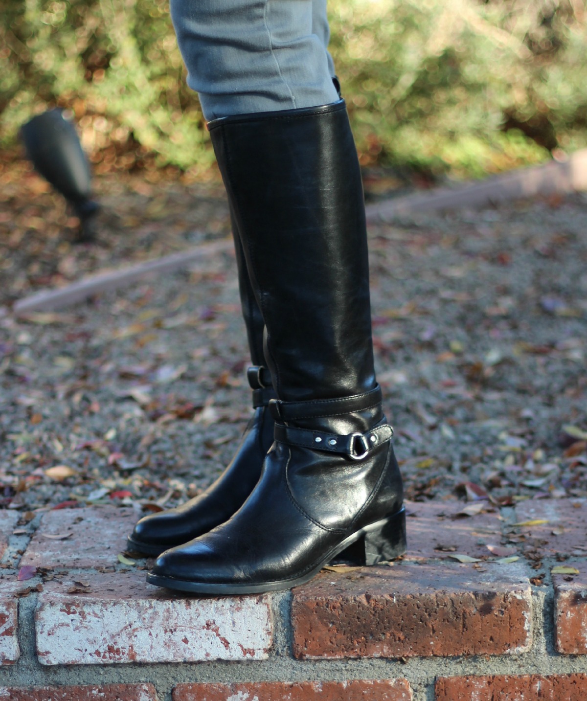 riding boots and jeans