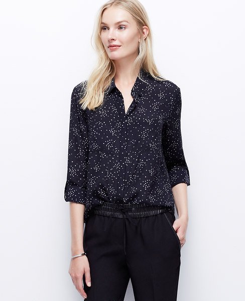 This cute silk blouse is one of the items currently 50% off at Ann Taylor.