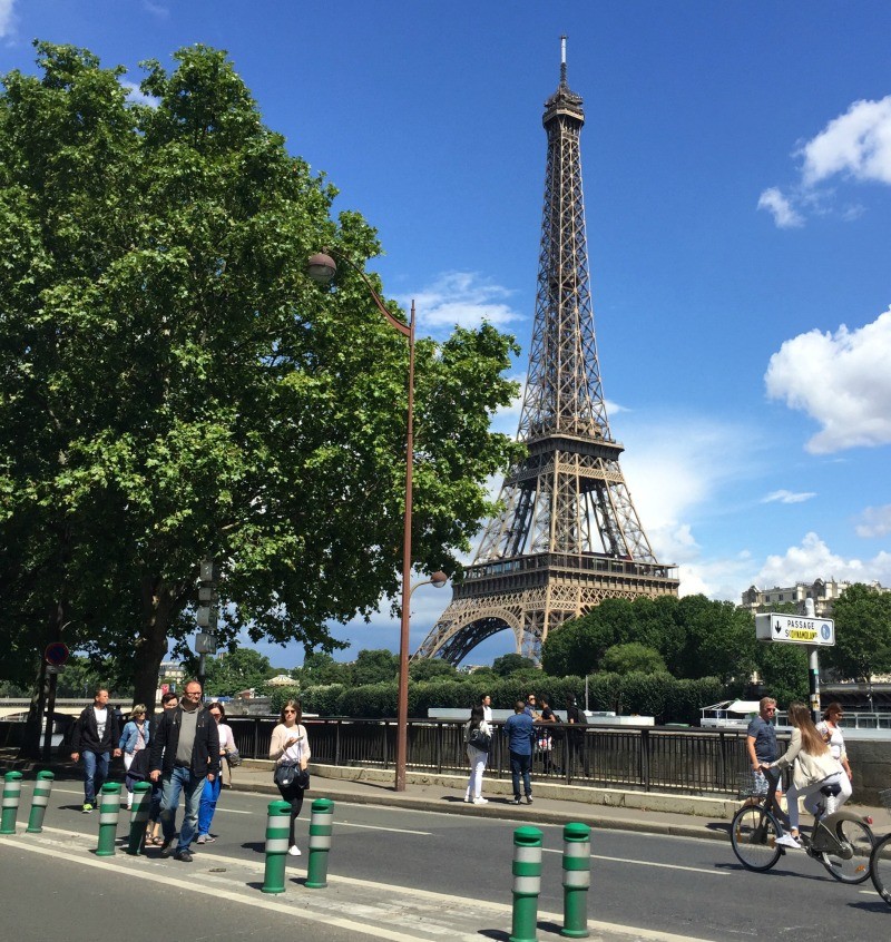 Paris Eiffel Tower as seen from 16th arrondisement. Details at une femme d'un certain age.