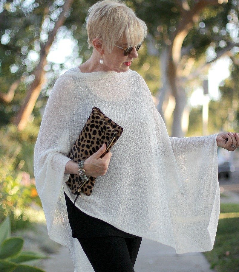 dressing for the heat in a sheer poncho