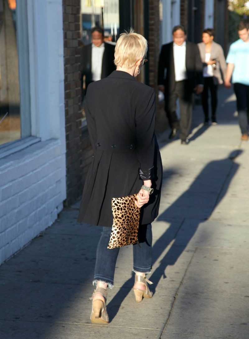 Susan B styles a long navy jacket with leopard print and metallic sandals at unefemme.net