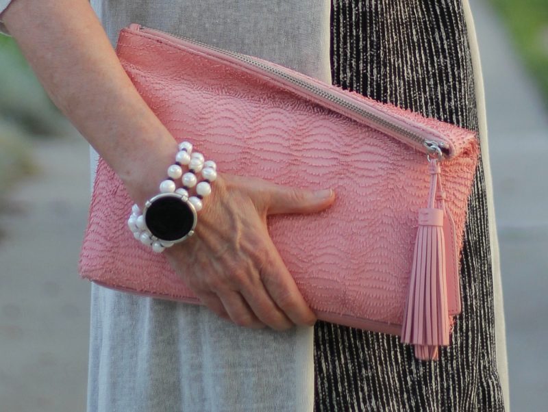 Loeffler Randall fringe clutch and French Kande pearl bracelet. Details at une femme d'un certain age.