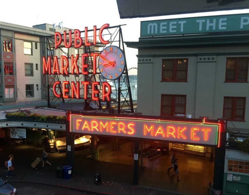 neon sign at entrance to Pike Place Market in Seattle.