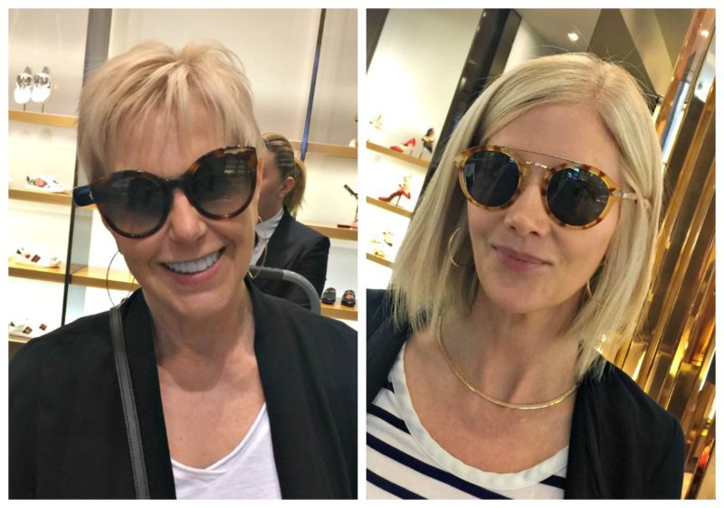 style blogger Susan B. and friend Karen try on sunglasses at Gucci