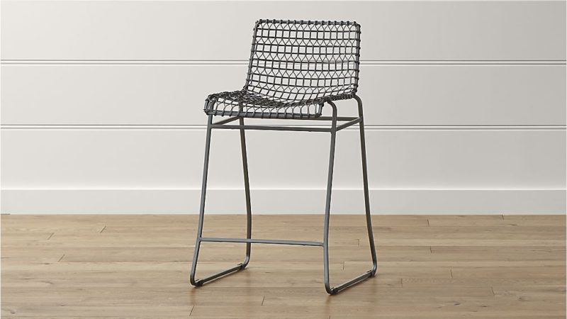 Wire counter stool. Details at une femme d'un certain age.