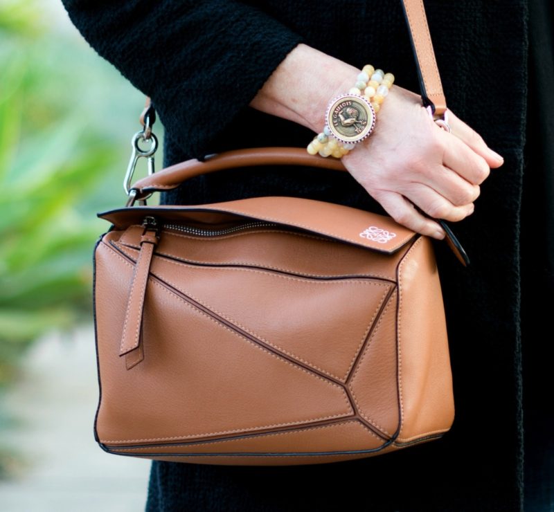 Detail: tan Loewe small puzzle bag and French Kande bracelet with vintage French medallion. Info at une femme d'un certain age.