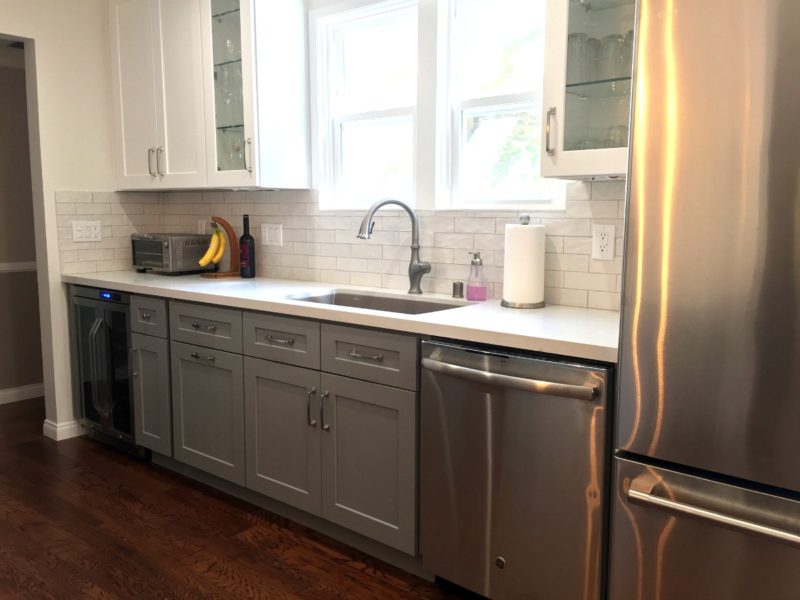 Grey and white kitchen after remodel. Details at une femme d'un certain age.