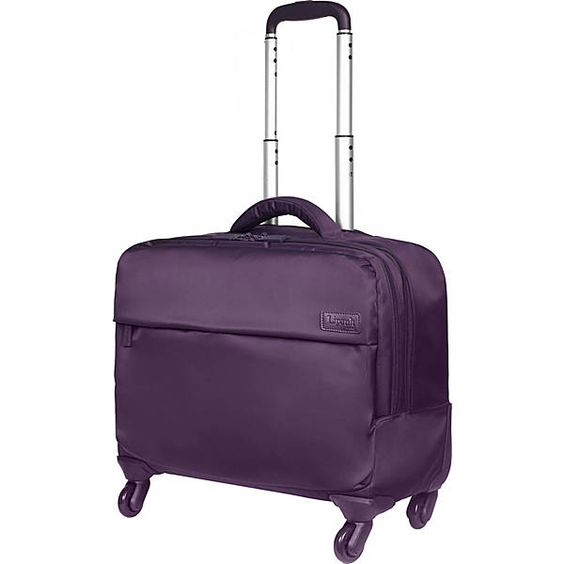 Lipault Plume lightweight under-seat spinner luggage. Details at une femme d'un certain age.