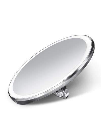 lighted magnifying mirror for travel. More travel amenities at une femme d'un certain age. 