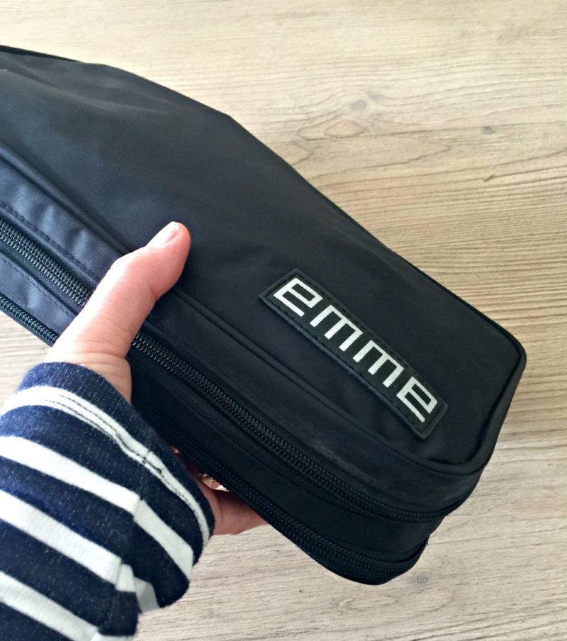 The EMME travel toiletries bag is compact once closed. Details at une femme d'un certain age.
