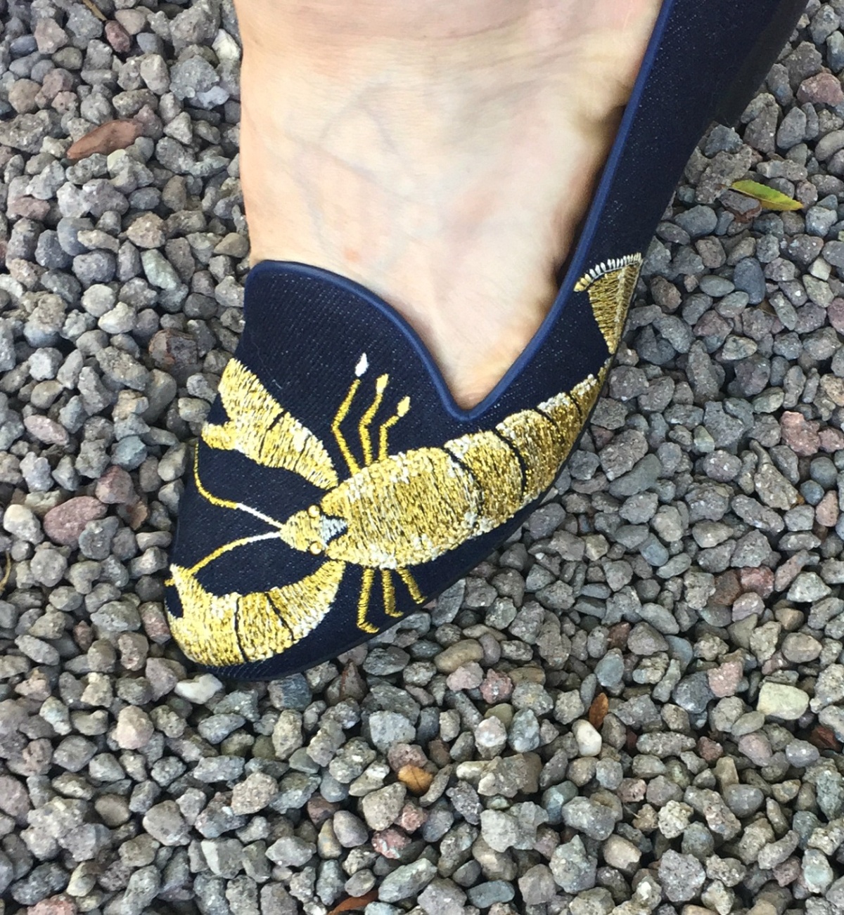 side detail on lobster-embroidered flats. Details at une femme d'un certain age.