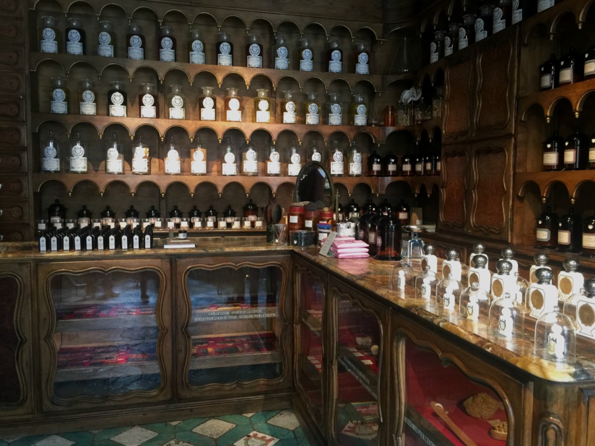 Display cases of fragrance and personal care products at L'Officine Universelle Buly in Paris. Details at une femme d'un certain age.