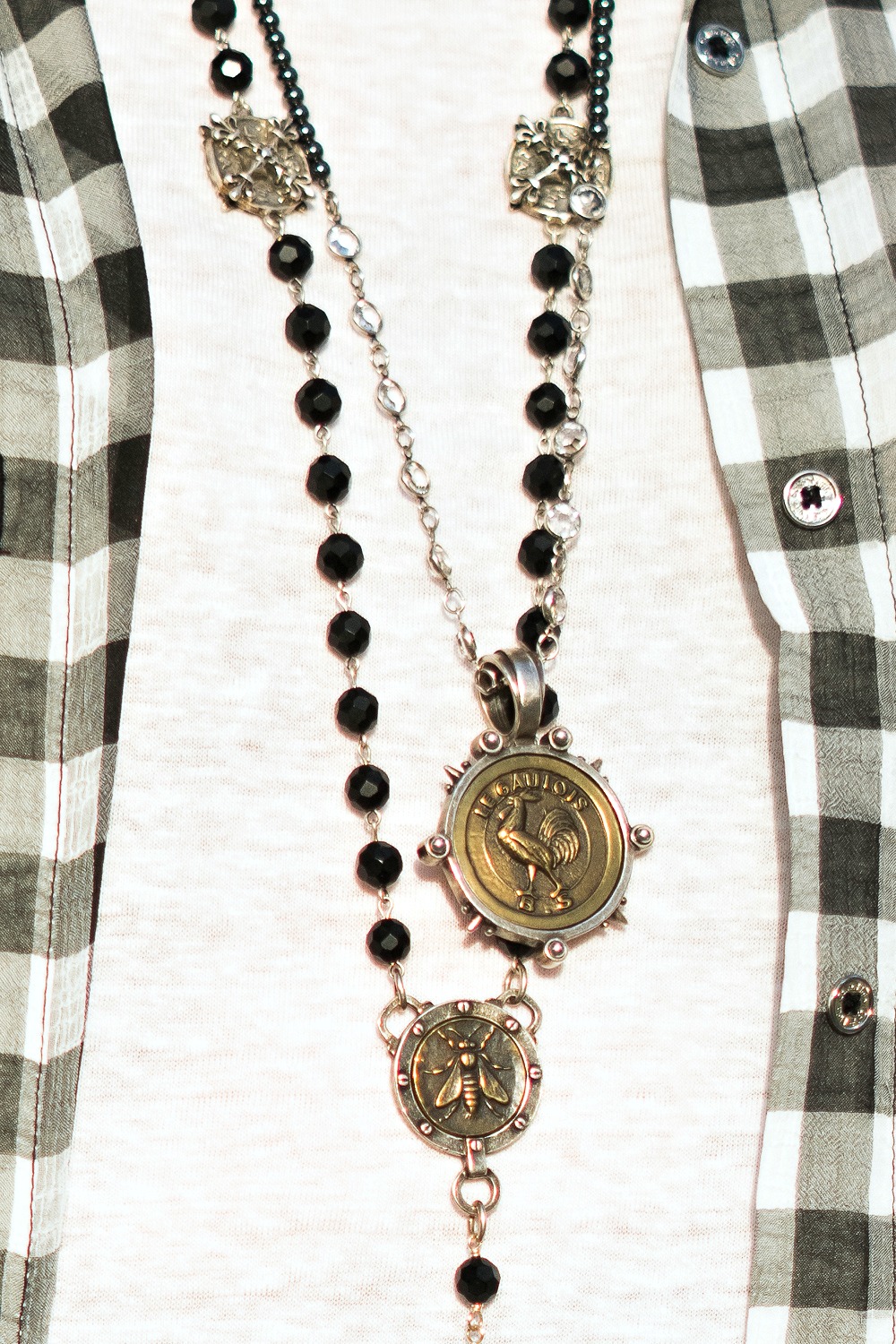 Details: French Kande jewelry with vintage French medallions. Details at une femme d'un certain age.