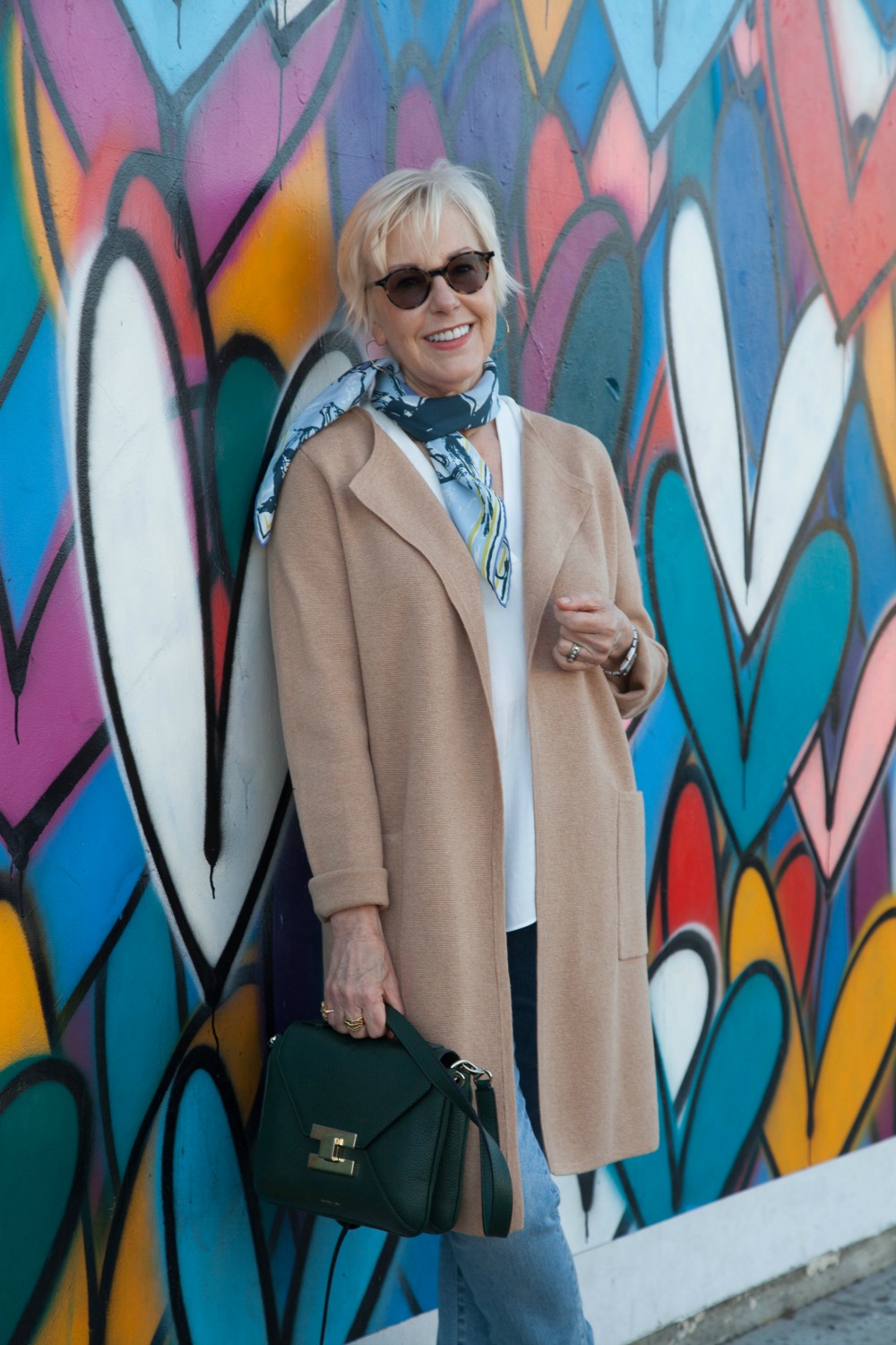 Style blogger Susan B. wears an Hermés scarf and DeMellier bag. Info at une femme d'un certain age.