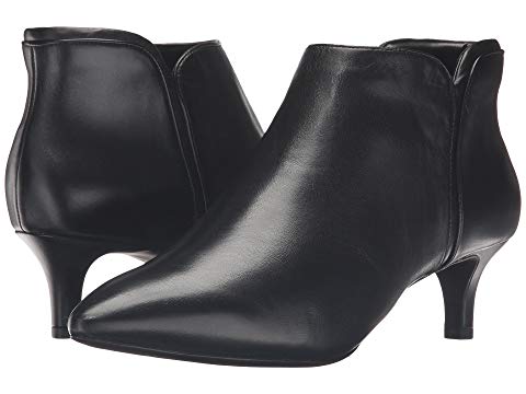 Black kitten heel ankle boots with side zip. Details at une femme d'un certain age.
