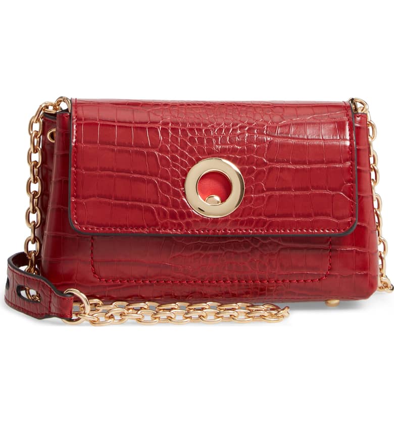 Red croc-embossed faux leather bag with chain strap detail. More at une femme d'un certain age.
