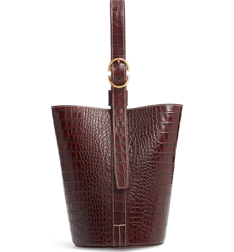 Trademark brown crocodile embossed bucket bag. Details at une femme d'un certain age.
