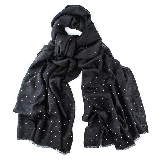 This black cashmere scarf has embedded Swarovski crystals for extra sparkle. Details at une femme d'un certain age.