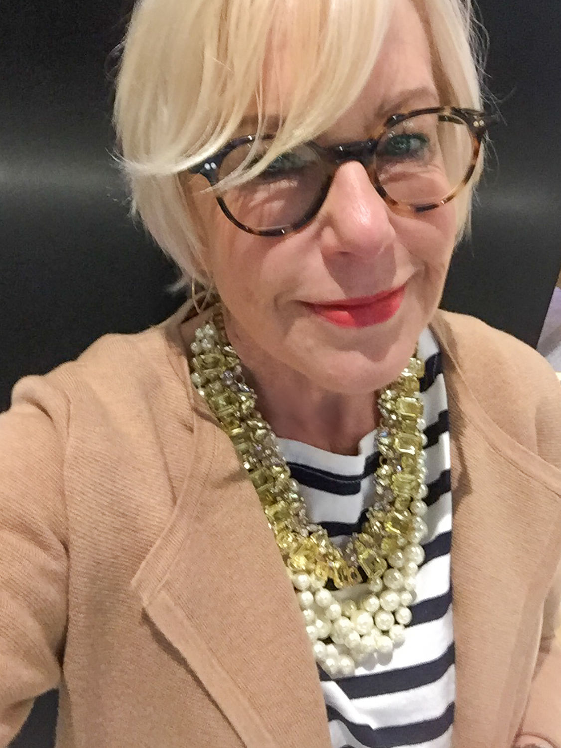 Style blogger Susan B. wears layered necklaces and striped tee from J.Crew. Details at une femme d'un certain age.