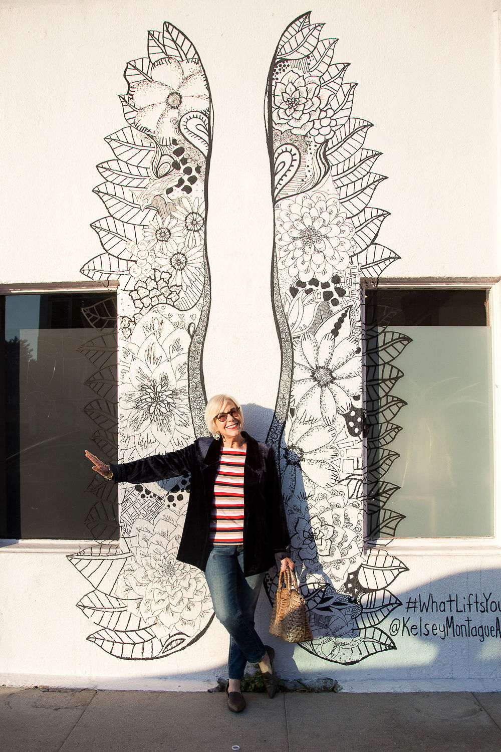 Style blogger Susan B. on Abbott Kinney Blvd. in Venice, CA. Wearing an Eileen Fisher Velvet jacket and J.Crew striped tee. Details at une femme d'un certain age.