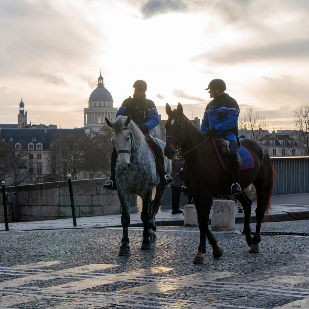 Paris police on horseback on Ile St. Louis. More at une femme d'un certain age.