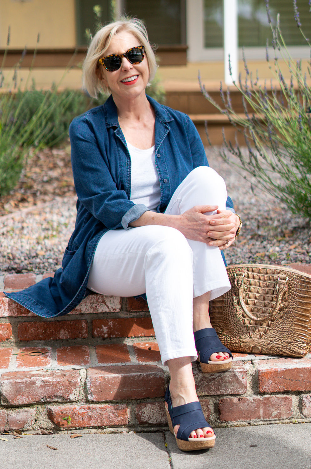 Susan B of une femme d'un certain age wears a casual brunch look with blue Clark's platform sandals.