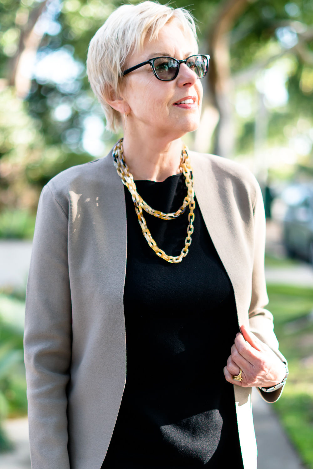 Susan Blakey of une femme d'un certain age wears M.M. LaFleur Woolf Jardigan, Eileen top and Mabel necklace