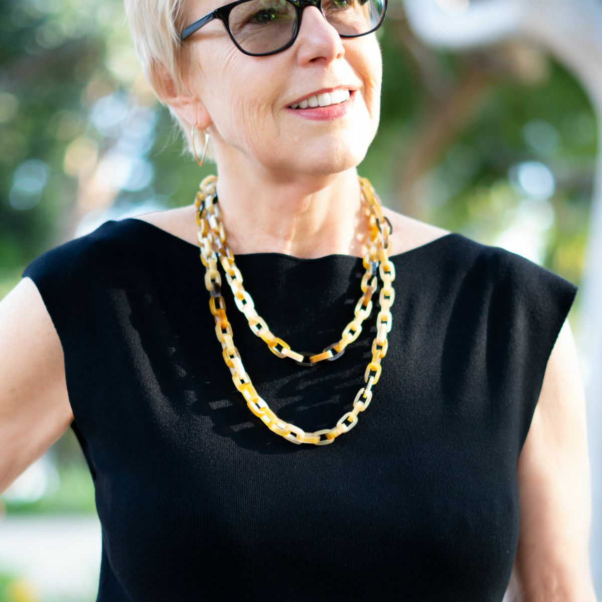 Susan B. of une femme d'un certain age wears M.M. LaFleur Eileen top and Mabel necklace.