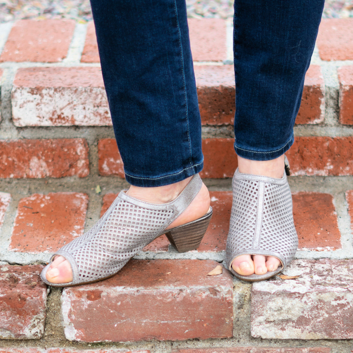 Detail: Susan B. of une femme d'un certain age wears Paul Green Lois sandals in silver metallic.