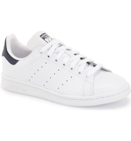 Adidas classic white Stan Smith sneaker. See the Paris summer style trends for footwear at une femme d'un certain age.