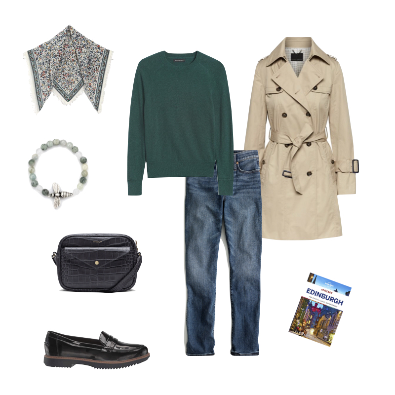 Fall travel outfit with green sweater and accessories, classic trench, black patent platform loafers. Details at une femme d'un certain age.