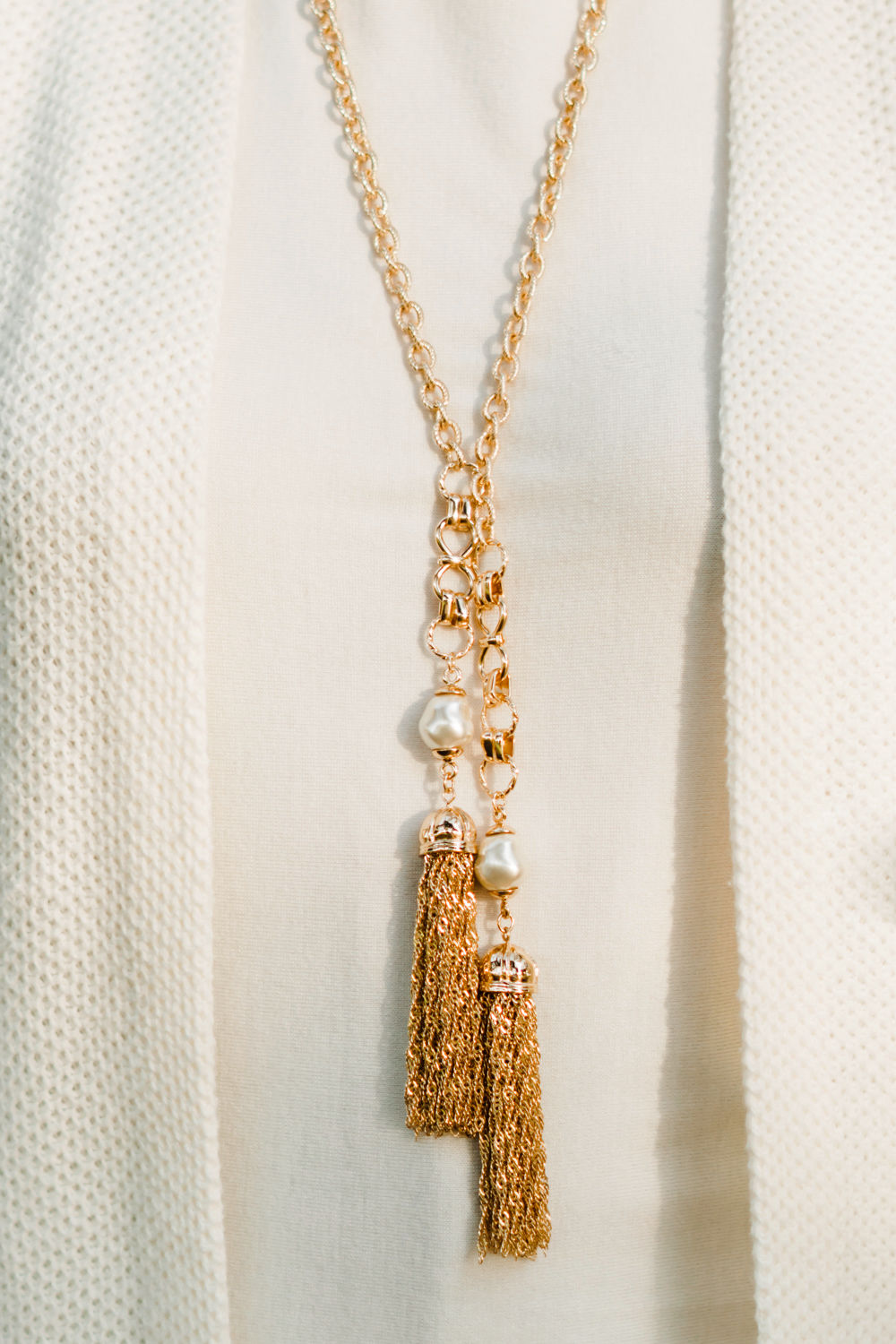Detail: a gold and pearl tassel necklace worn by Susan B. of une femme d'un certain age.