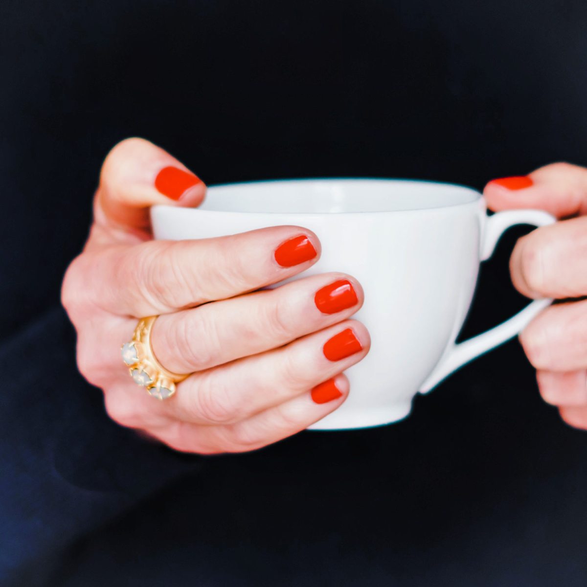 Susan B wears Essie Gel Couture polish "Rock The Runway" and gold French Kande ring. Details at une femme d'un certain age.