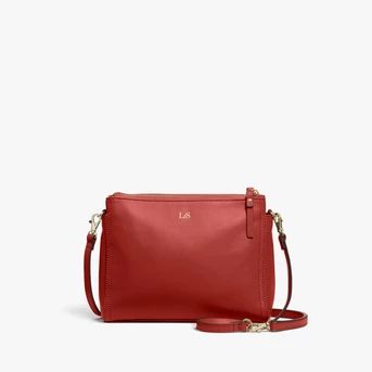 Lo & Sons Pearl crossbody bag, my favorite for travel! Details at une femme d'un certain age.