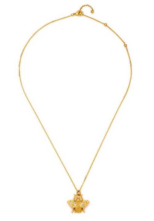 French Kande FK golden micro bee necklace. Details at une femme d'un certain age.