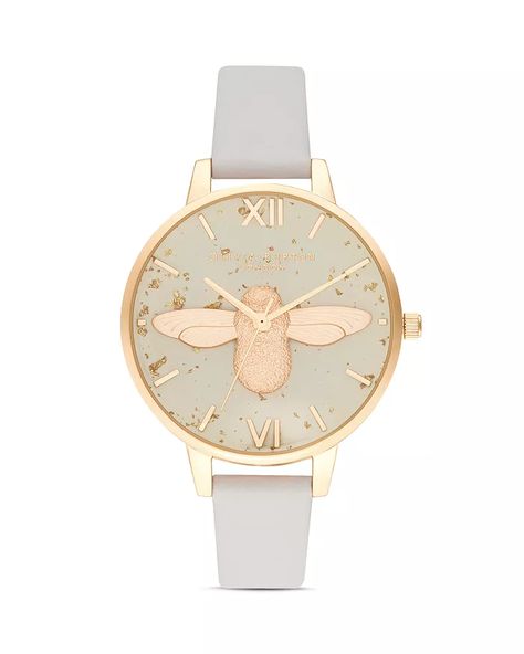 Olivia Burton celestial bee watch in gray and gold. Details and more bee jewelry at une femme d'un certain age.