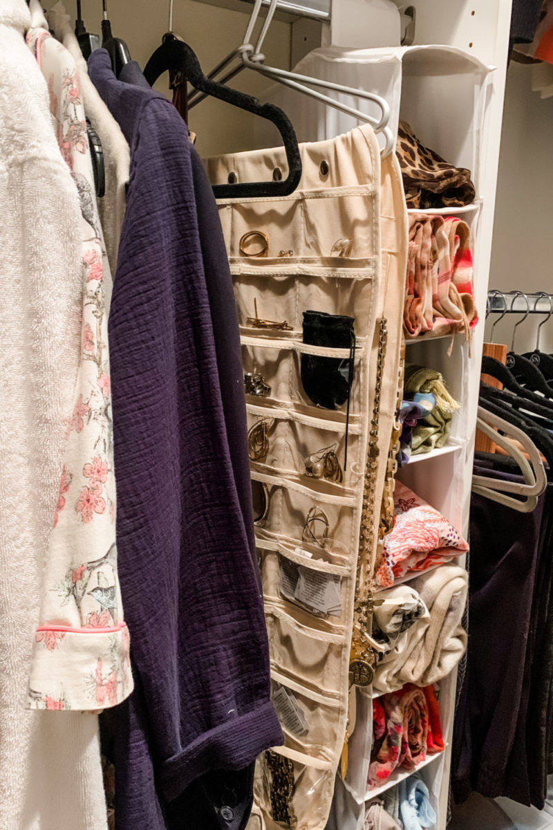 Closet organization: longer hanging items, jewelry & scarves. Details at une femme d'un certain age.