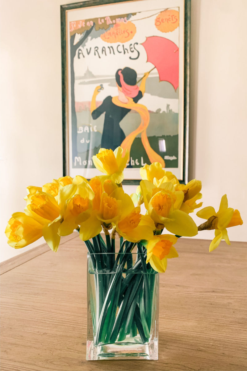 Daffodils and a vintage French travel poster. More at une femme d'un certain age.