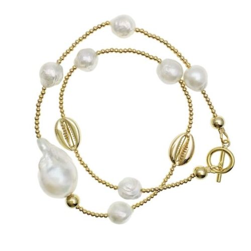 Farra freshwater pearl bracelet with shell charms. Details at une femme d'un certain age.