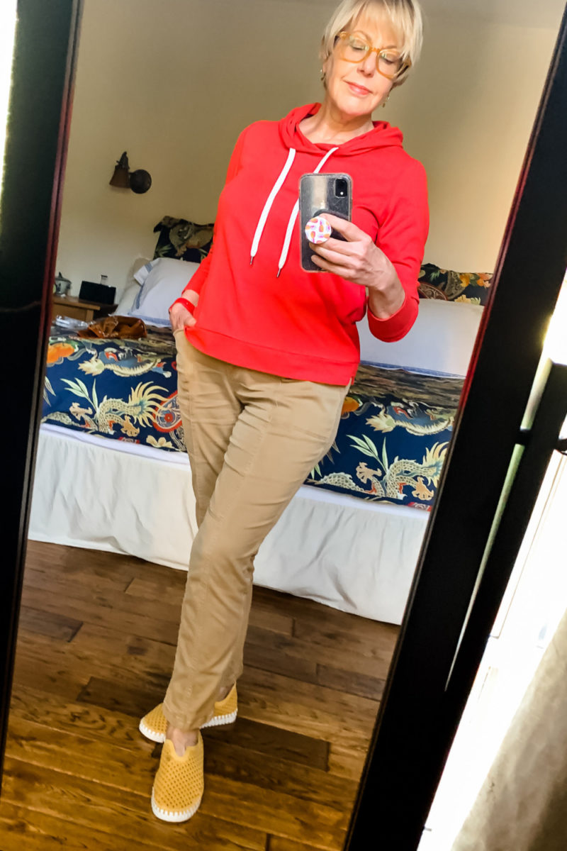 Susan B. wears a Vuori hoodie, Chico's utility pants and Ilse Jacobsen shoes. Details and more "elevated sweats" at une femme d'un certain age.