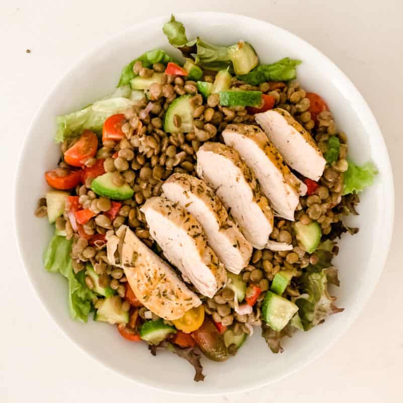 Focusing on whole food nutrition with Faster Way to Fat Loss. This lentil salad with grilled chicken breast is one of my favorite lunches! Details and more about shaping up after 60 at une femme d'un certain age.