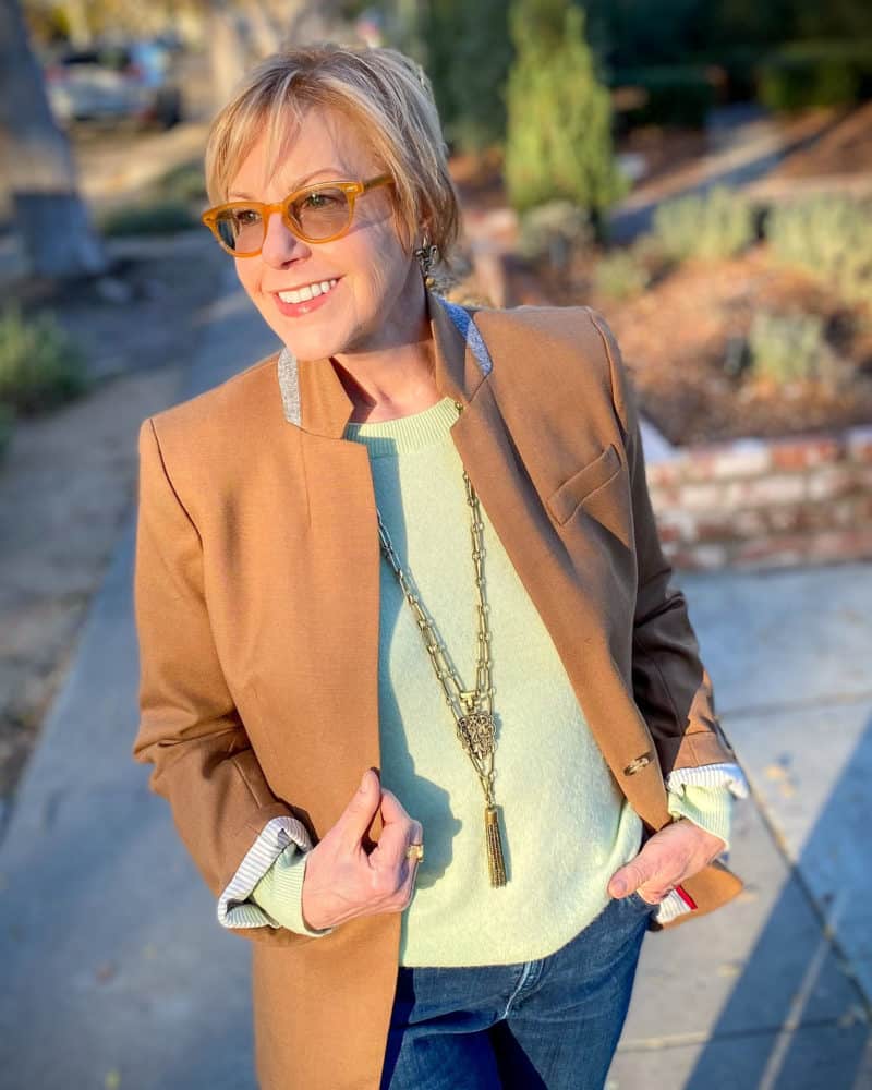 Outfit details: Susan B. wears a J.Crew jacket and cashmere sweater, French Kande jewelry. Info at une femme d'un certain age.