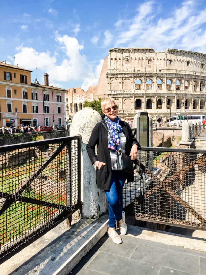 Susan Blakey in front of Coliseum in Rome, 2017