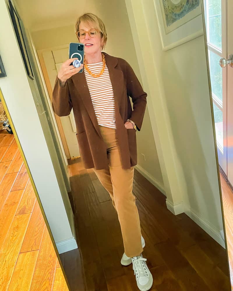 Susan B. wears a J.Crew sweater blazer outfit with corduroy pants, striped tee, and sneakers.