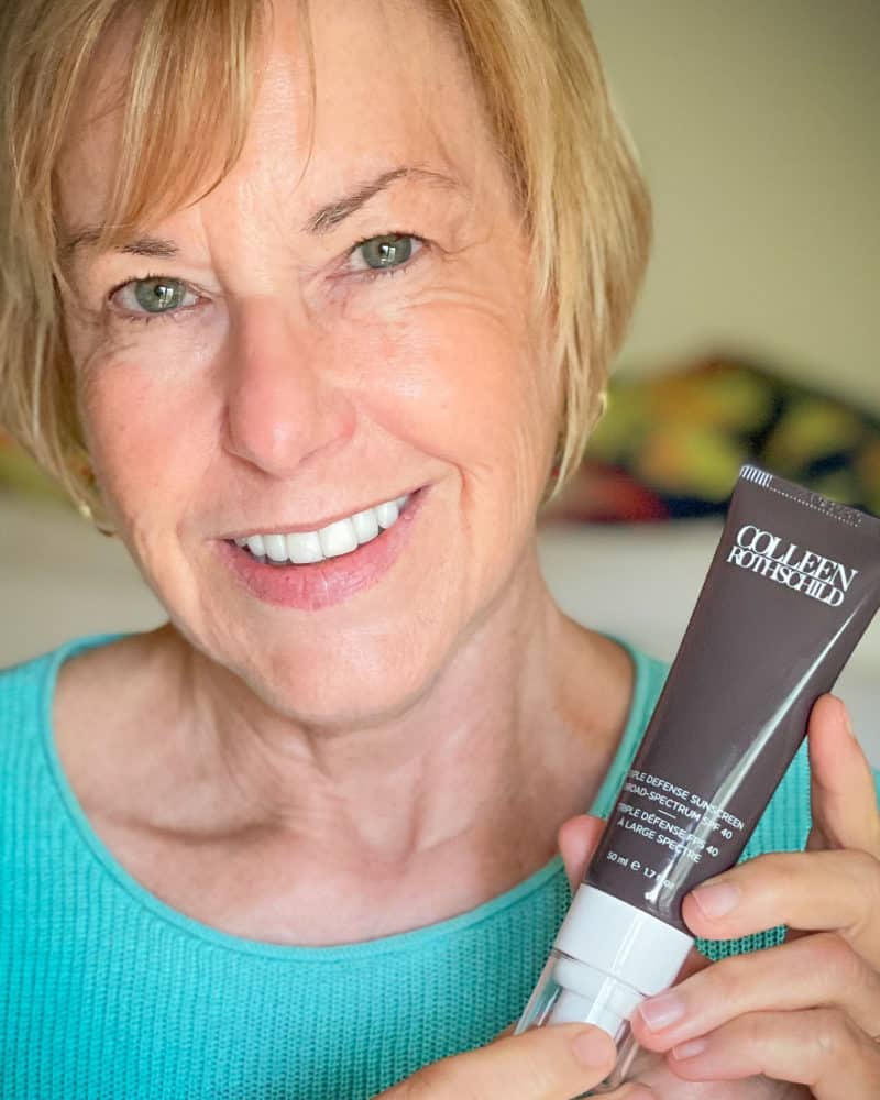 Sunscreen, ALWAYS! Susan with tube of Colleen Rothschild Triple Defense Sunscreen SPF 40.