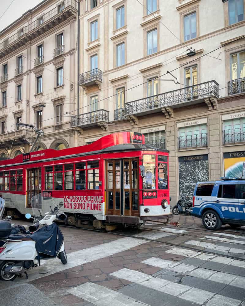 Red trolley car in Milan, Italy.
