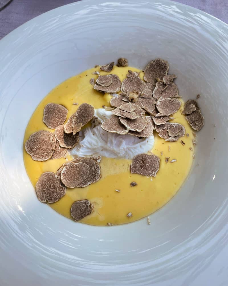 Creamy polenta with shaved white truffle at Rabayà in Barbaresco Italy.