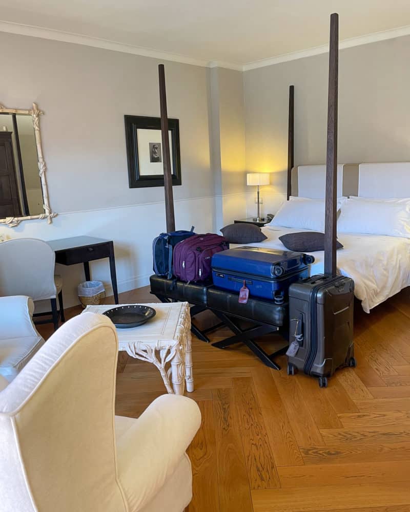 Our room at Villa d'Amelia, with luggage.