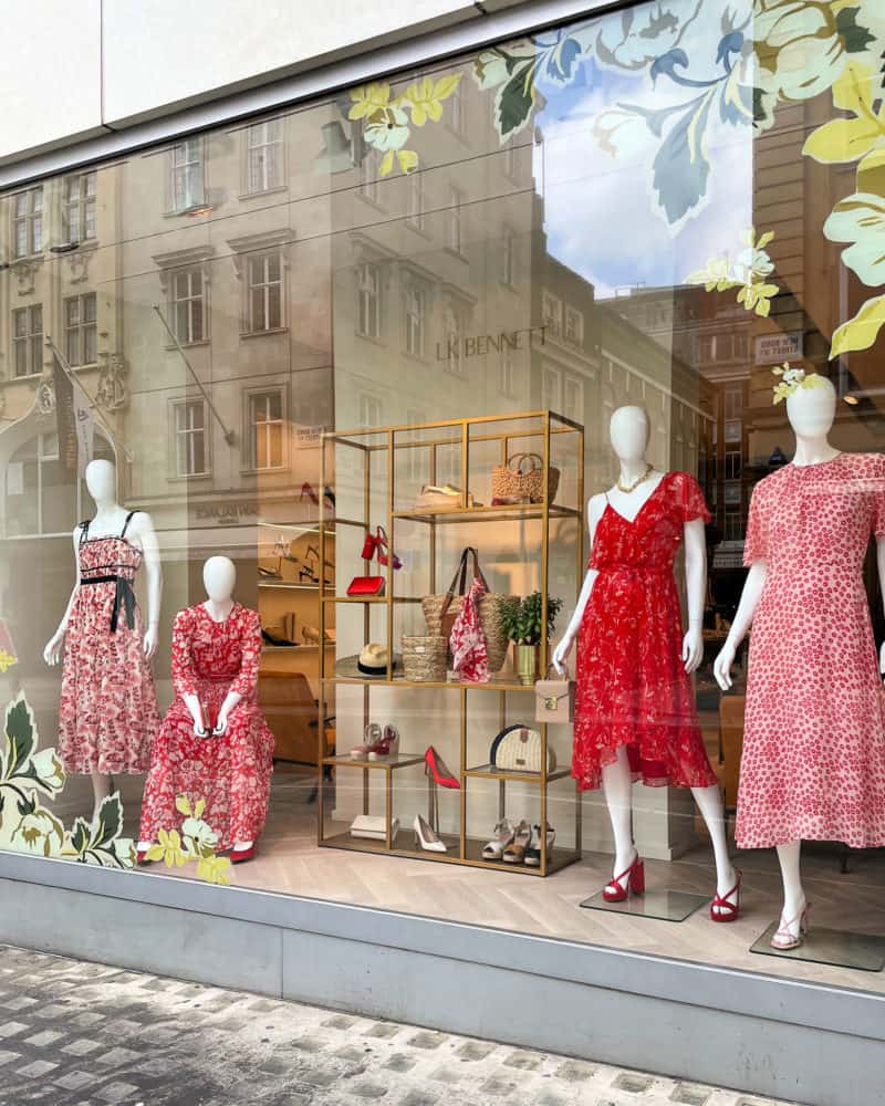 Red and white floral dresses in LK Bennett window, London.