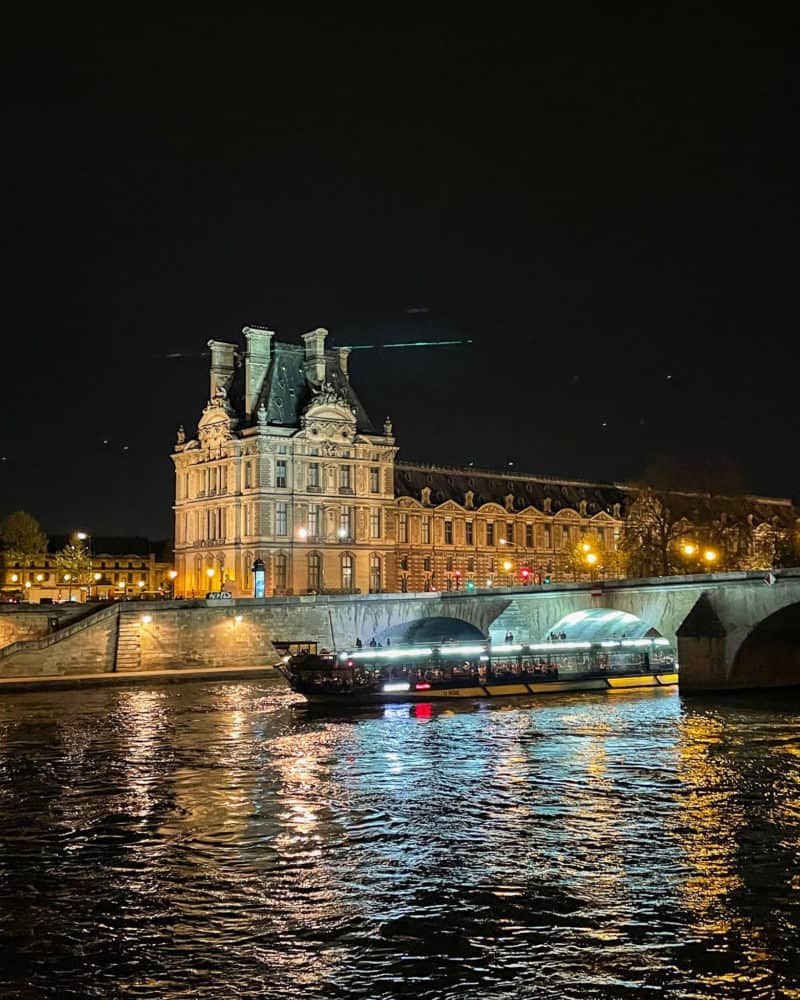 Looking across the Seine toward the Louvre at night, Paris.